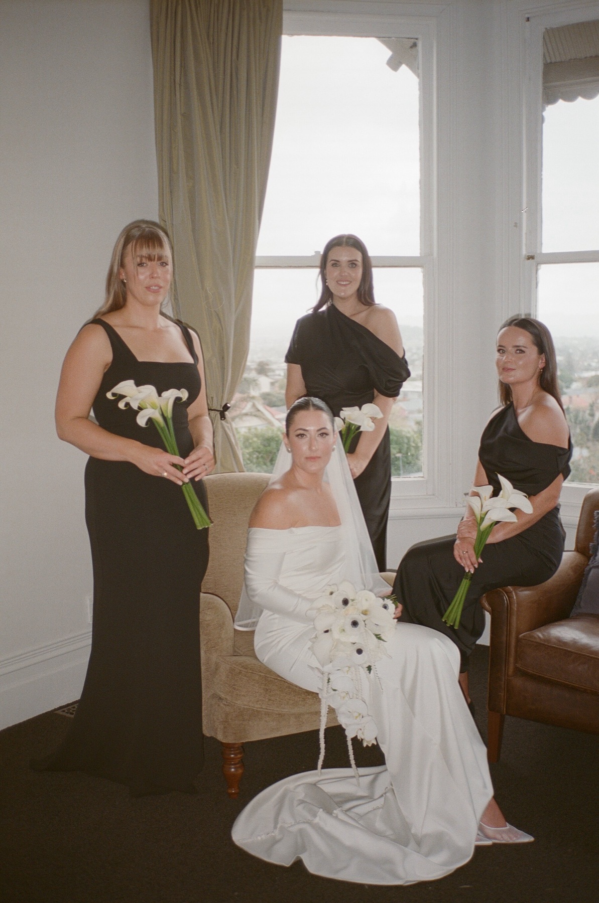 35mm film portrait of a bride and her bridesmaids